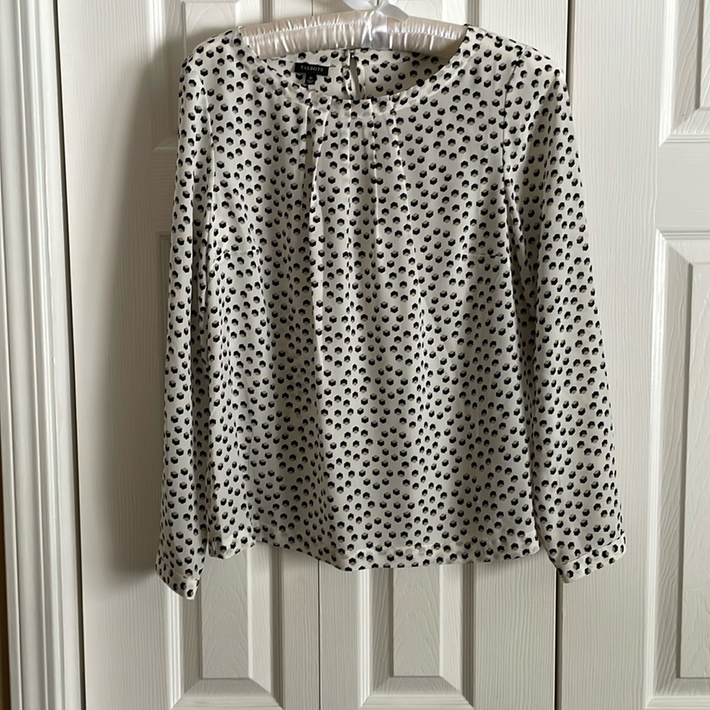 Silk blouse/gold buttons. White black/tan geometric squares.Excellent condition.